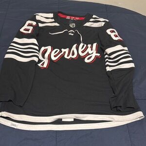Black and White Jersey with Red Accents